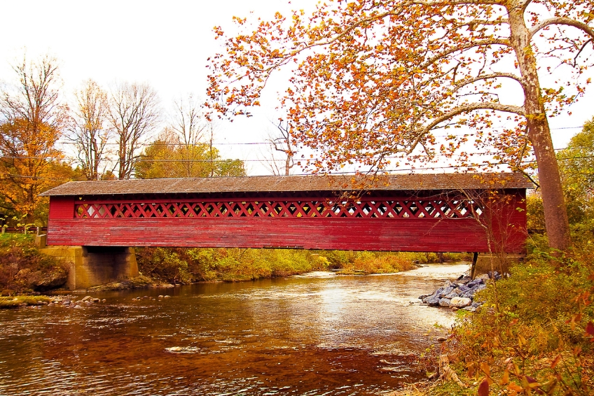 A Vermont covered bridge in fall foliage