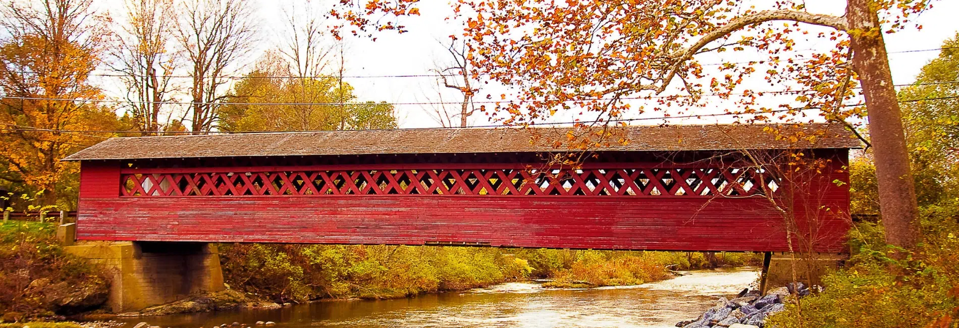 A Vermont covered bridge in fall foliage