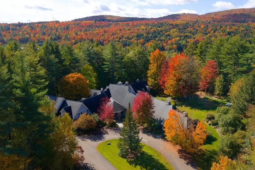 Exterior of Stone Hill Inn in fall